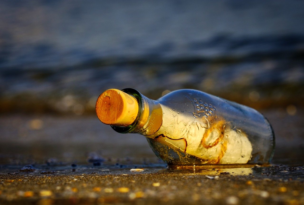 bottle on sandy beach